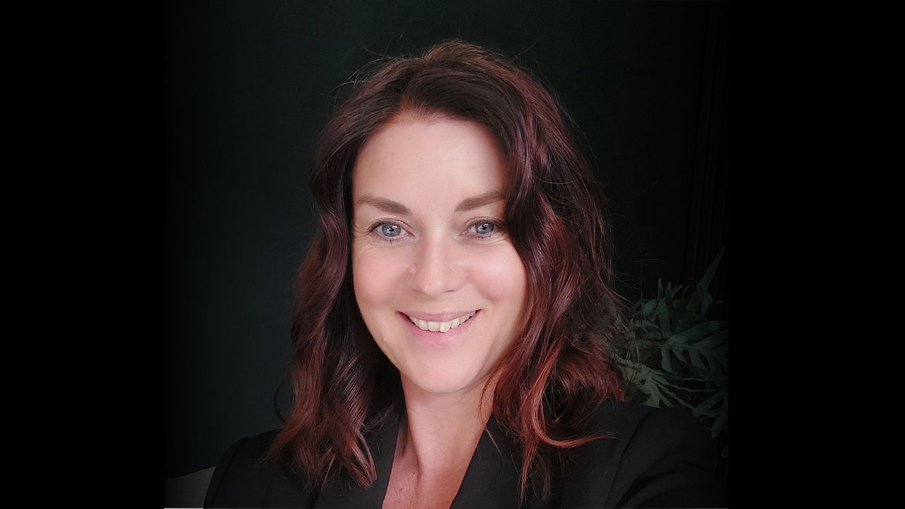 Woman visiting UC Online Master of Strategic Communication webpage 