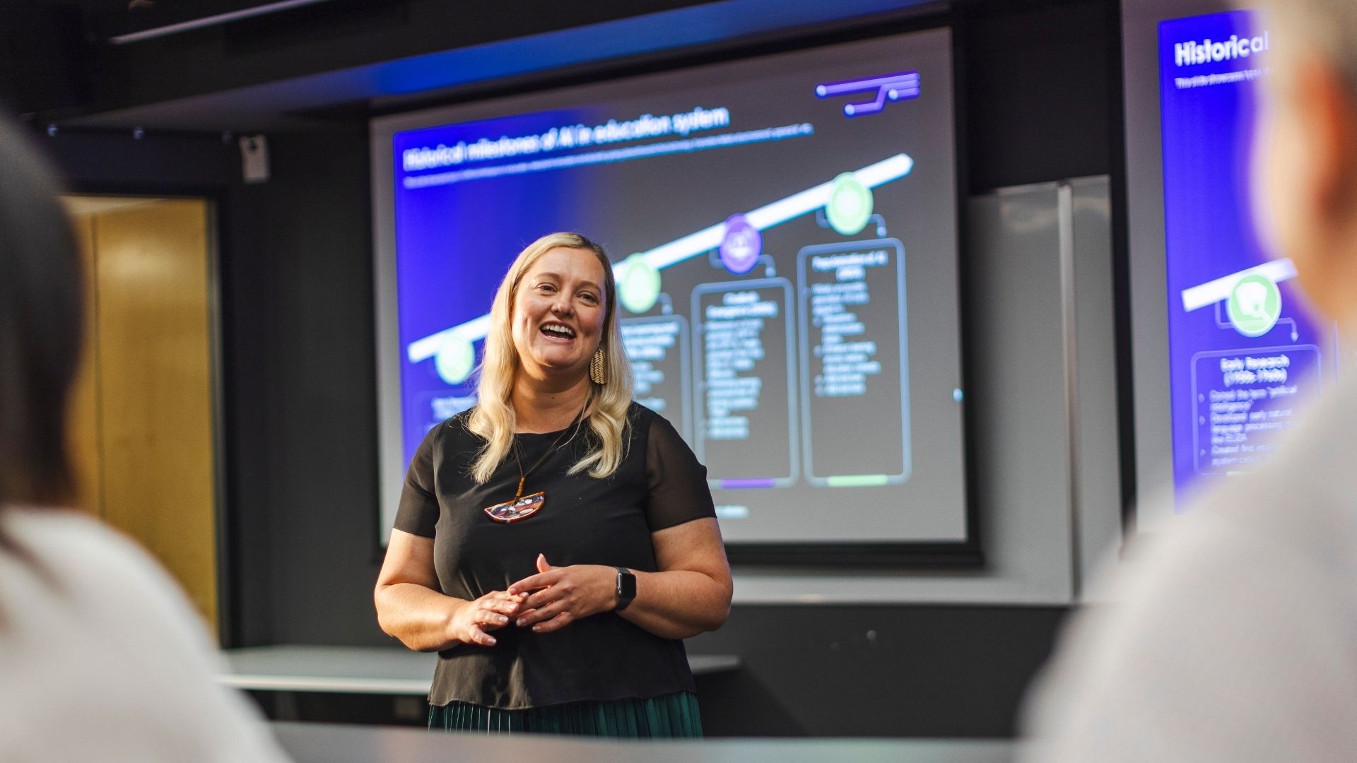 AI and digital education expert Kathryn MacCallum shares AI and education insights in front of learners