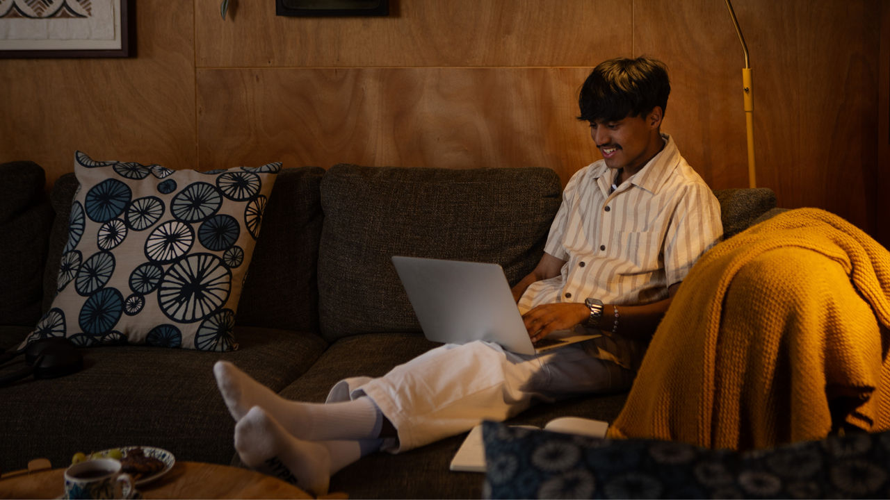 Student studying online, showcasing the flexibility of earning an online bachelor's degree from the University of Canterbury.