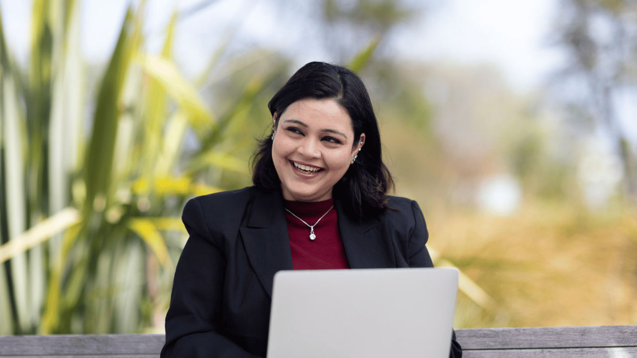 Woman reading her latest assignment in a postgraduate certificate in sustainability and innovation