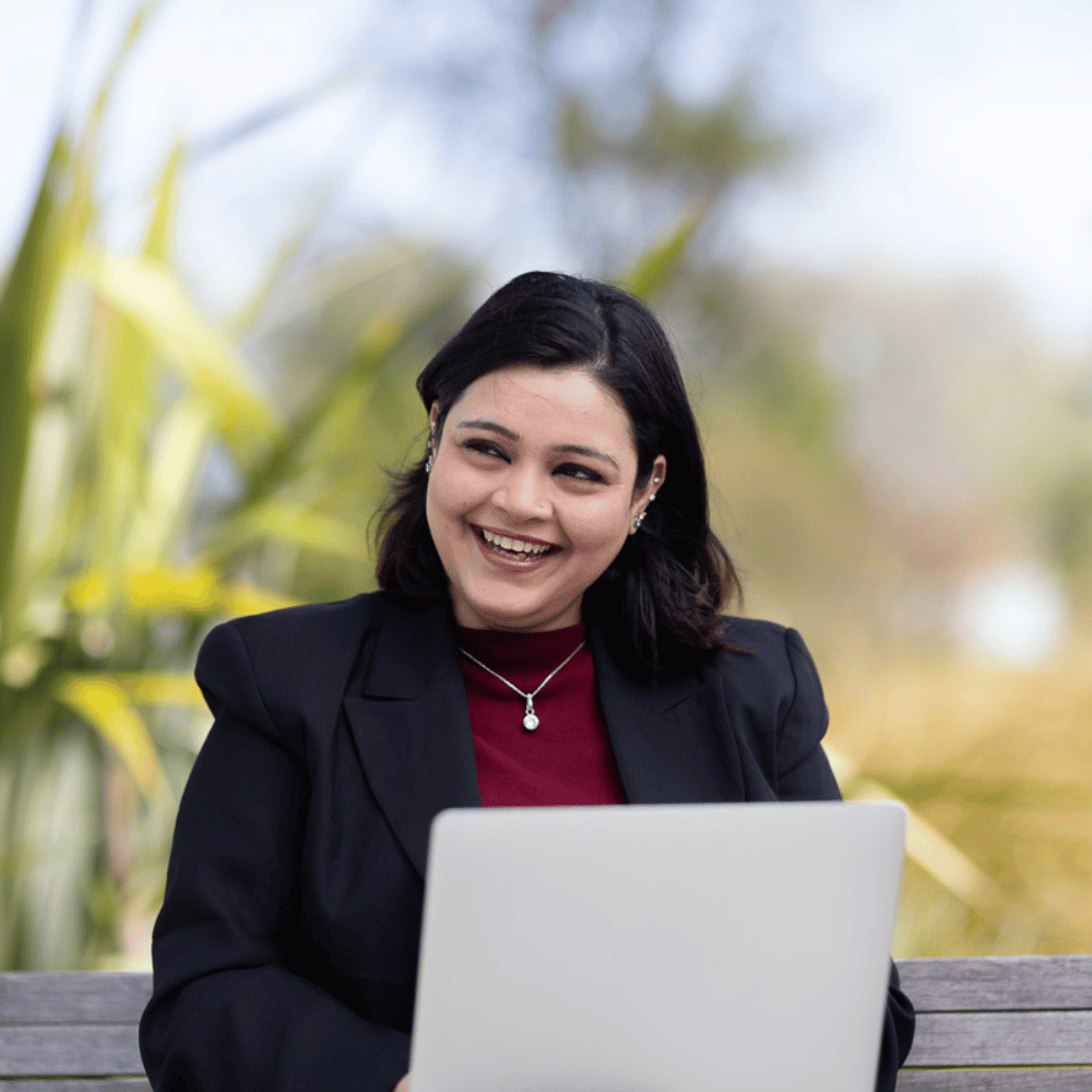 Woman reading her latest assignment in a postgraduate certificate in sustainability and innovation